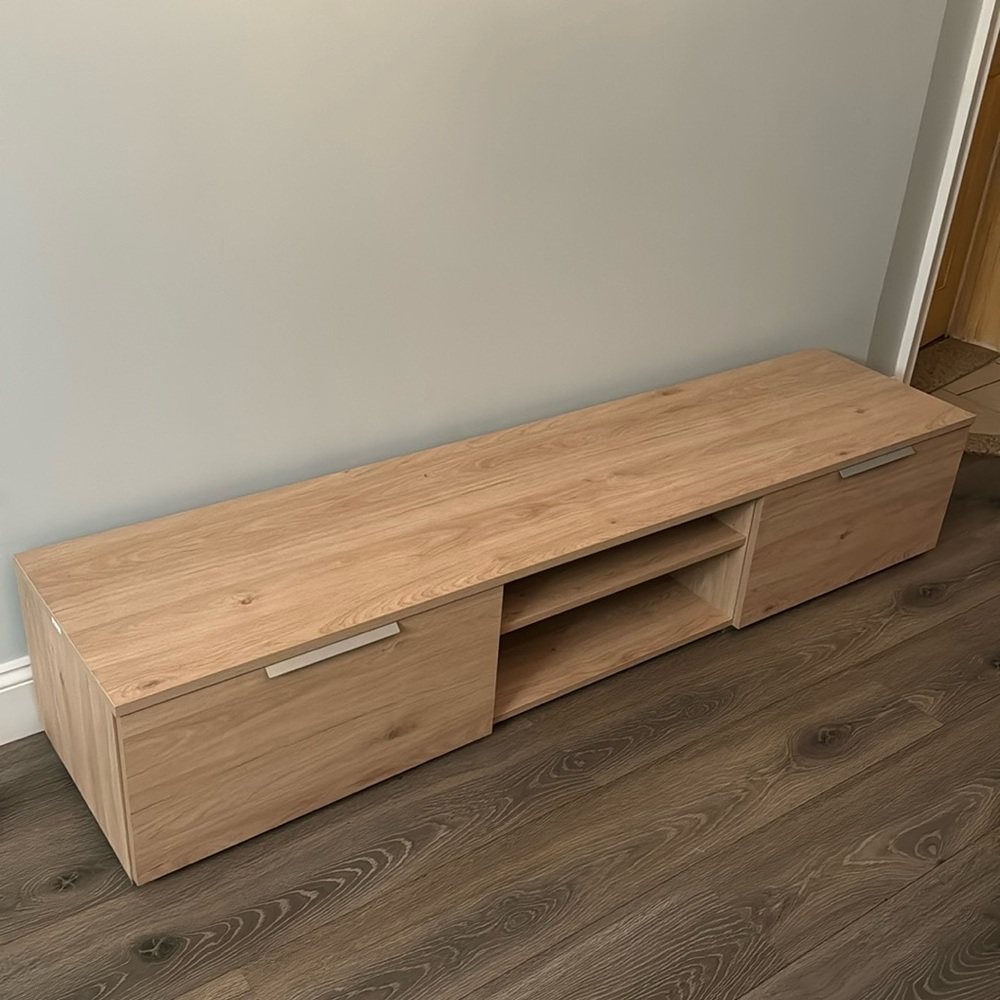BRAND NEW! NEVER USED. TV STAND. COULD BE USED AS A TV STAND OR HOME DECORE